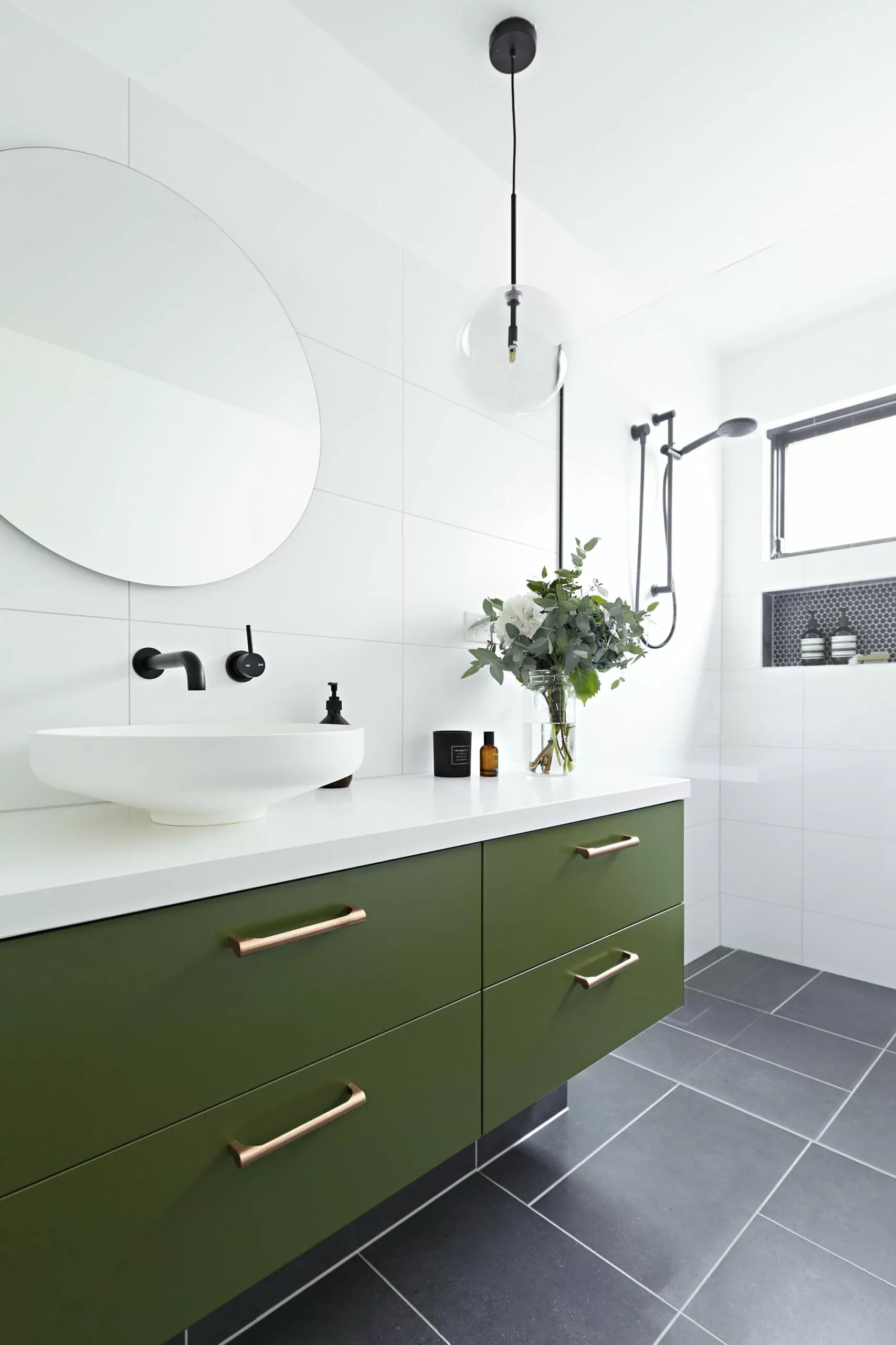 modern bathroom with copper cabinet handles